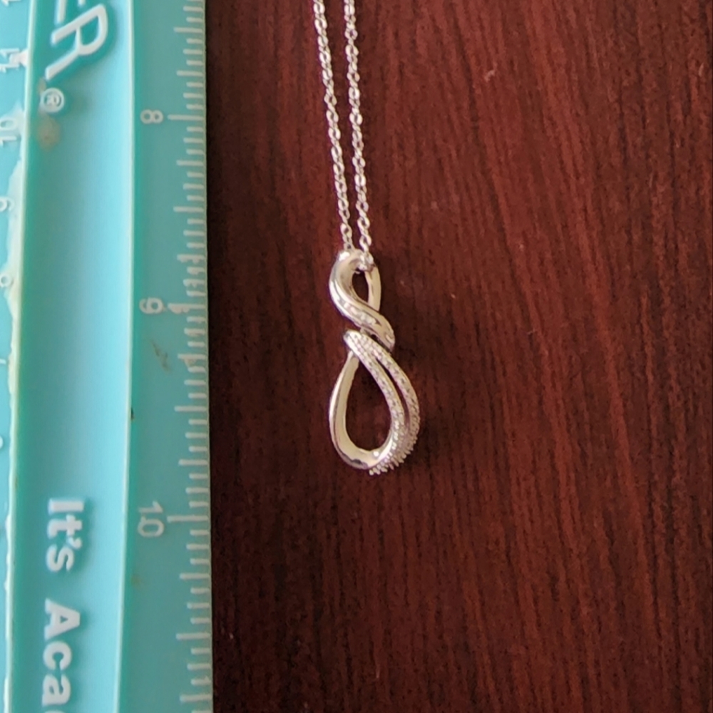 Silver swirl pendant with 18" necklace